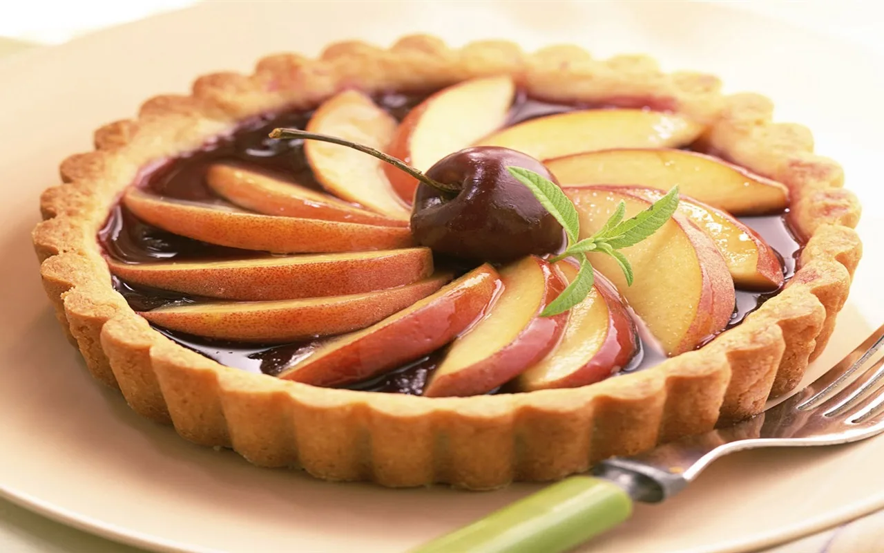 Offrez-vous un paradis hivernal : une combinaison de pommes cuites au four et de cheesecake